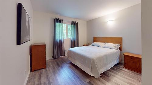 599 10 Highway, Onanole, MB - Indoor Photo Showing Bedroom