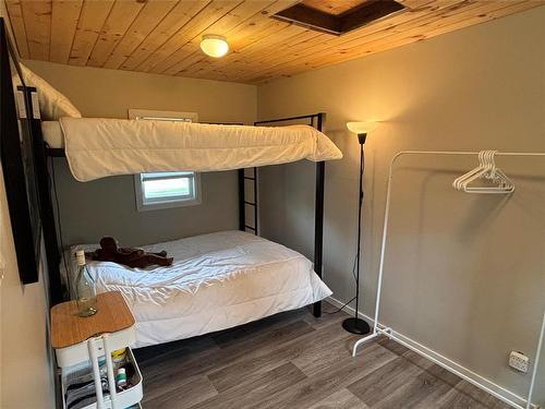 599 10 Highway, Onanole, MB - Indoor Photo Showing Bedroom