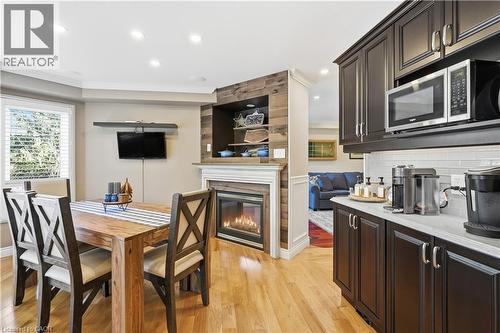 48 Chester Crescent, Georgetown, ON - Indoor Photo Showing Dining Room With Fireplace