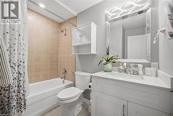 Full bathroom with vanity and shower / bath combination with curtain - 