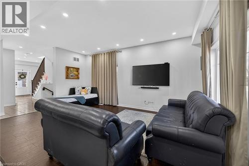 Living area featuring wood finished floors and recessed lighting - 80 Severino Circle, Smithville, ON - Indoor Photo Showing Living Room