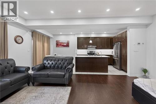 Living area featuring light wood-style floors and recessed lighting - 80 Severino Circle, Smithville, ON - Indoor Photo Showing Living Room