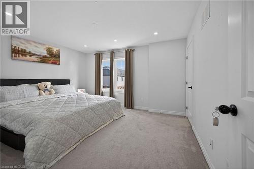 Bedroom featuring light colored carpet and recessed lighting - 80 Severino Circle, Smithville, ON - Indoor Photo Showing Bedroom