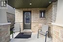 Entrance to property featuring stone siding - 80 Severino Circle, Smithville, ON  - Outdoor With Exterior 