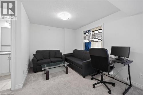 Office with light colored carpet and a textured ceiling - 80 Severino Circle, Smithville, ON - Indoor Photo Showing Office