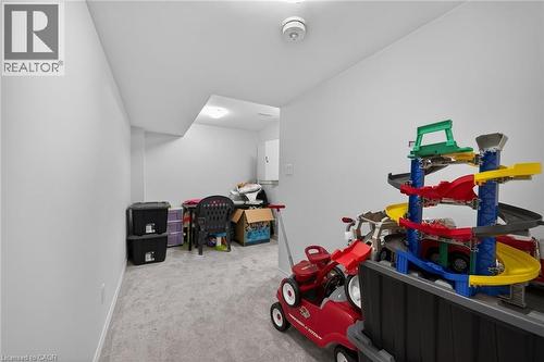 Game room featuring light colored carpet and baseboards - 80 Severino Circle, Smithville, ON - Indoor Photo Showing Other Room
