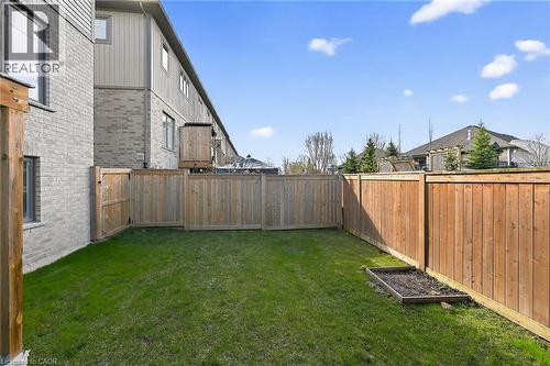 Fenced backyard featuring a residential view - 80 Severino Circle, Smithville, ON - Outdoor