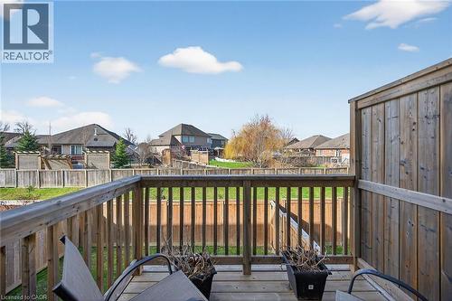 Wooden terrace featuring a residential view and a fenced backyard - 80 Severino Circle, Smithville, ON - Outdoor With Balcony With Exterior
