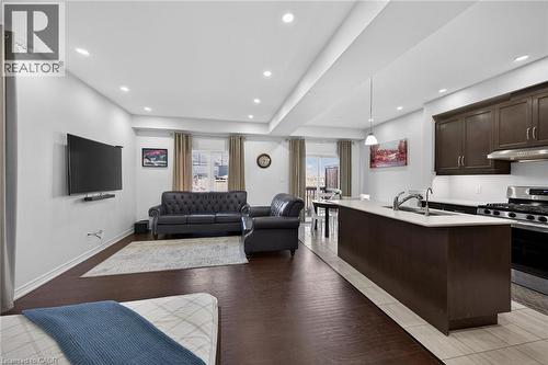 Living room featuring light wood-style flooring and recessed lighting - 80 Severino Circle, Smithville, ON - Indoor