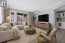 Virtually Staged - 206 - 316 Savard Avenue, Ottawa, ON  - Indoor Photo Showing Living Room 