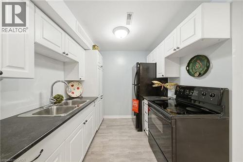 15 Finch Place, Hamilton, ON - Indoor Photo Showing Kitchen With Double Sink