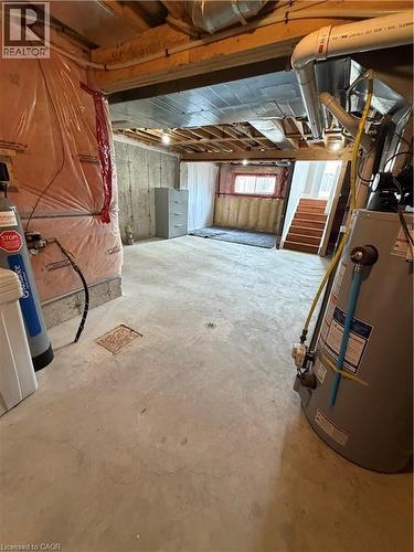 Below grade area featuring gas water heater and stairway - 45 Brookfield Crescent, Kitchener, ON - Indoor