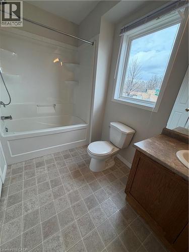 Bathroom with vanity and tub / shower combination - 45 Brookfield Crescent, Kitchener, ON - Indoor Photo Showing Bathroom