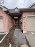 View of exterior entry featuring brick siding, a shingled roof, and a garage - 45 Brookfield Crescent, Kitchener, ON  - Outdoor With Exterior 