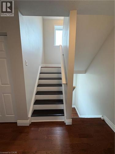 Staircase with wood finished floors and baseboards - 45 Brookfield Crescent, Kitchener, ON - Indoor Photo Showing Other Room