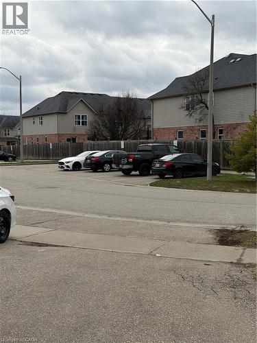 Uncovered parking lot featuring a residential view - 45 Brookfield Crescent, Kitchener, ON - Outdoor