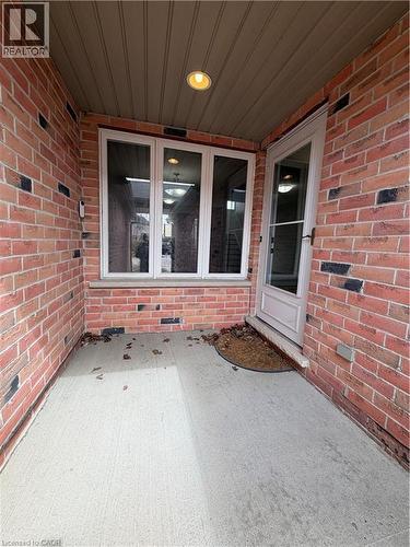 Entrance to property featuring brick siding and a patio area - 45 Brookfield Crescent, Kitchener, ON - Outdoor With Deck Patio Veranda With Exterior