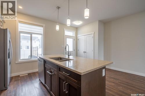 4624 Buckingham Drive E, Regina, SK - Indoor Photo Showing Kitchen With Double Sink