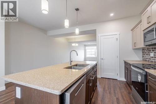 4624 Buckingham Drive E, Regina, SK - Indoor Photo Showing Kitchen With Double Sink With Upgraded Kitchen