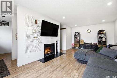 208 67 Rodenbush Drive, Regina, SK - Indoor Photo Showing Living Room With Fireplace