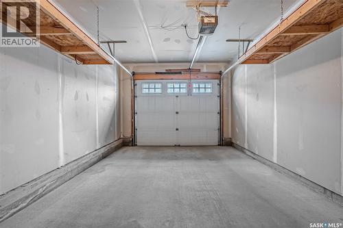202 615 Lynd Crescent, Saskatoon, SK - Indoor Photo Showing Garage