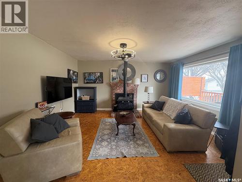 643 3Rd Street W, Shaunavon, SK - Indoor Photo Showing Living Room With Fireplace