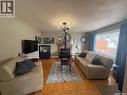 643 3Rd Street W, Shaunavon, SK  - Indoor Photo Showing Living Room With Fireplace 