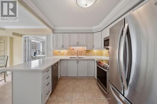 404 - 1272 Ontario Street, Burlington, ON - Indoor Photo Showing Kitchen With Double Sink With Upgraded Kitchen