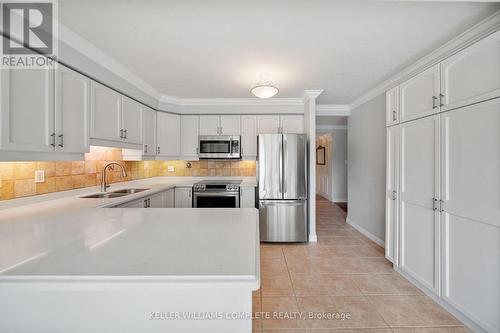 404 - 1272 Ontario Street, Burlington, ON - Indoor Photo Showing Kitchen With Double Sink
