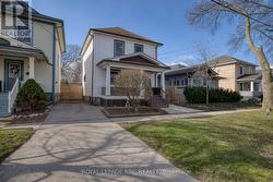 Front entrance with view of driveway. - 