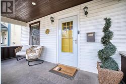 Generous porch to enjoy your morning coffee! - 