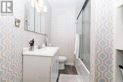 An attractive 4-pc is found upstairs. - 