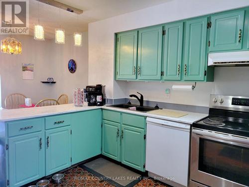 3 - 4 Paradise Boulevard, Ramara, ON - Indoor Photo Showing Kitchen With Double Sink
