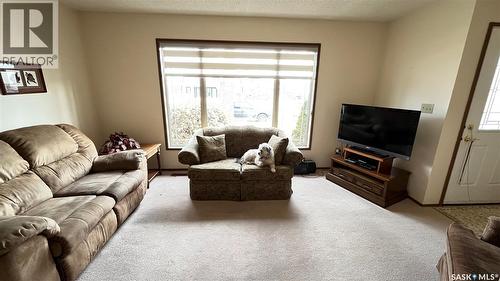 211 Maple Street, Maple Creek, SK - Indoor Photo Showing Living Room
