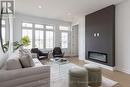 Photos of 70B - 70 C - 586 Seneca Drive, Fort Erie (Lakeshore), ON  - Indoor Photo Showing Living Room With Fireplace 