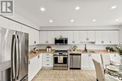 52 Norland Circle, Oshawa (Windfields), ON - Indoor Photo Showing Kitchen With Double Sink With Upgraded Kitchen