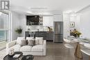 Living, Dining, Kitchen - Virtually Staged - 1801 - 33 Shore Breeze Drive, Toronto, ON  - Indoor 