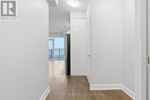 View Into Unit from the Front Hallway - 1801 - 33 Shore Breeze Drive, Toronto, ON - Indoor Photo Showing Other Room