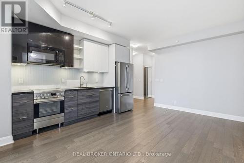 Open Concept with Contemporary Finishes - 1801 - 33 Shore Breeze Drive, Toronto, ON - Indoor Photo Showing Kitchen With Stainless Steel Kitchen With Upgraded Kitchen