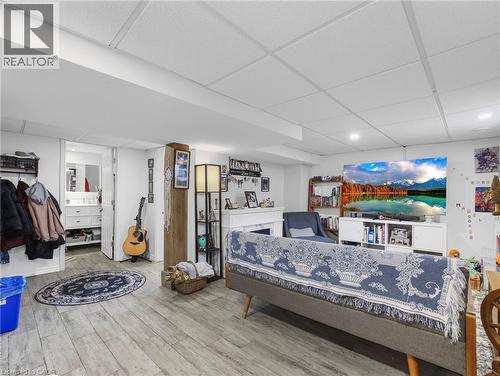 paneled ceiling and light wood-type flooring - 420 Waverly Street, Hamilton, ON - Indoor Photo Showing Other Room