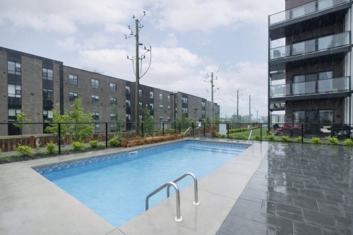 Pool - 106-3630 Rue Roland-Marquette, Longueuil (Saint-Hubert), QC - Outdoor With In Ground Pool