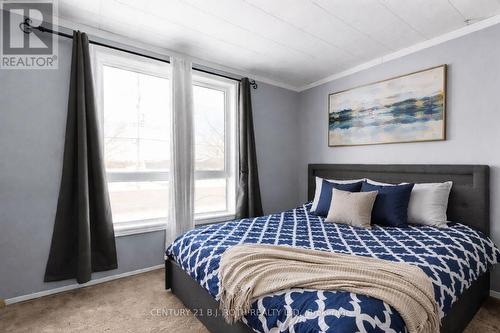 1006 Flos 4 Road E, Springwater, ON - Indoor Photo Showing Bedroom