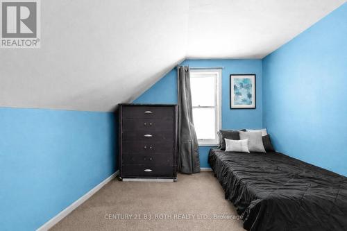 1006 Flos 4 Road E, Springwater, ON - Indoor Photo Showing Bedroom