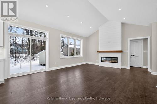 62 Rue Vanier, Tiny, ON - Indoor Photo Showing Living Room With Fireplace