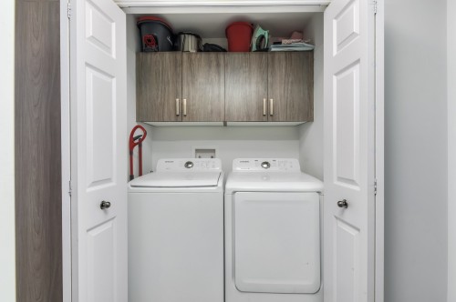 Salle de lavage - 1-8405 Rue De Londres, Brossard, QC - Indoor Photo Showing Laundry Room
