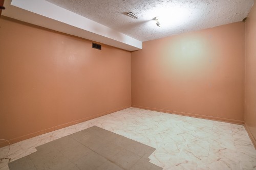 Sous-sol - 12 Rue Lesage, Dollard-Des-Ormeaux, QC - Indoor Photo Showing Other Room