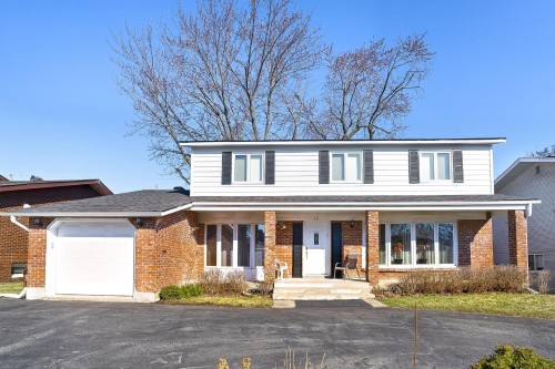 Façade - 12 Rue Lesage, Dollard-Des-Ormeaux, QC - Outdoor With Deck Patio Veranda With Facade