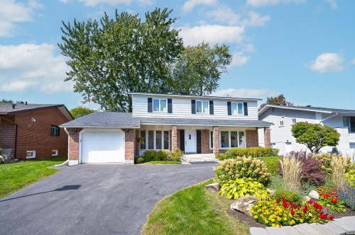 Façade - 12 Rue Lesage, Dollard-Des-Ormeaux, QC - Outdoor With Deck Patio Veranda With Facade