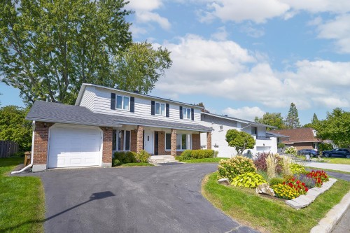 Façade - 12 Rue Lesage, Dollard-Des-Ormeaux, QC - Outdoor With Deck Patio Veranda With Facade