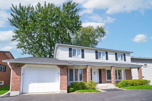 Façade - 12 Rue Lesage, Dollard-Des-Ormeaux, QC - Outdoor With Deck Patio Veranda With Facade